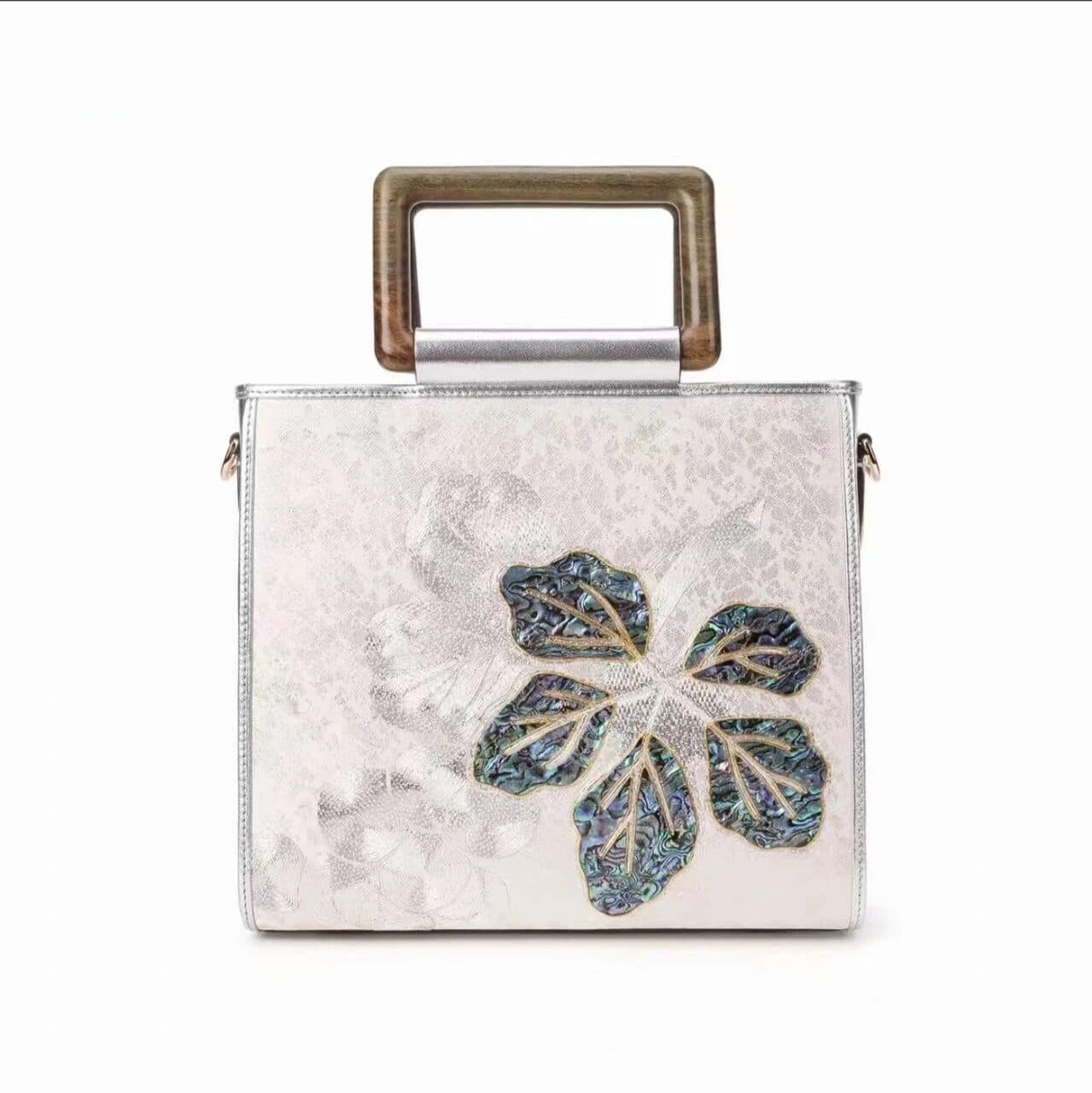 Mother-of-pearl embroidery and silver satin jacquard handbag Main view
